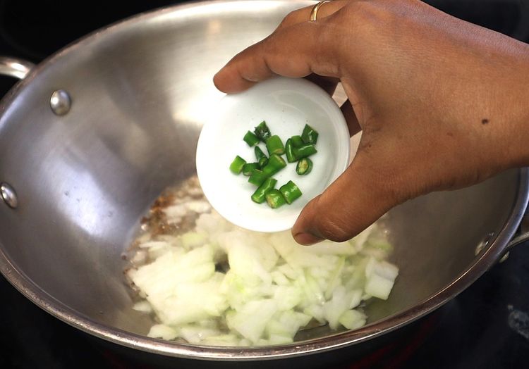 Step 1.2: Add chopped onions and green chillies