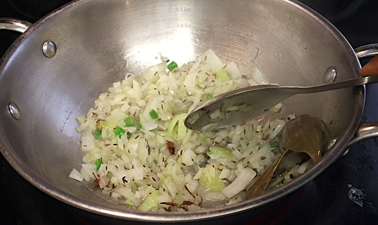 Step 1.4: Add chopped onions and green chillies
