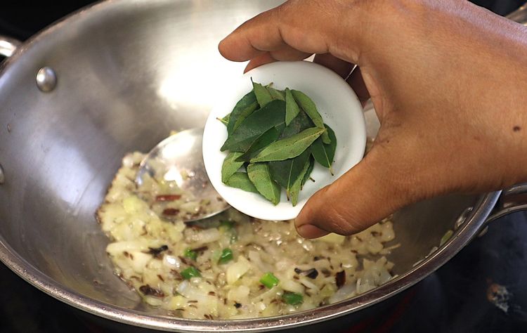 Step 1.6: Add chopped onions and green chillies