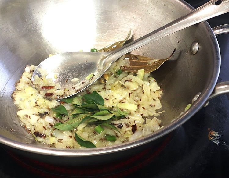 Step 1.7: Add chopped onions and green chillies