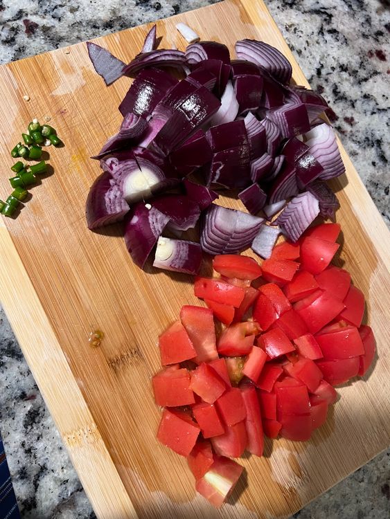 Step 1.1: Now, roughly chop the green chilies, onions, and tomatoes