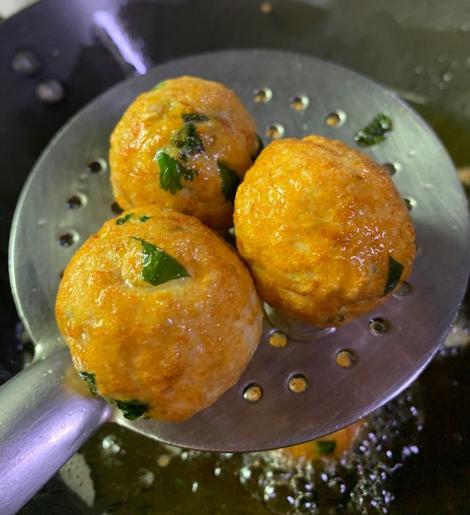 Step 1.2: Carefully add the chicken balls/koftas to the hot oil and fry until golden brown and cooked for about 5-7 minutes