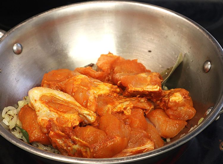 Step 1.2: Add marinated chicken and sauté for 2 minutes