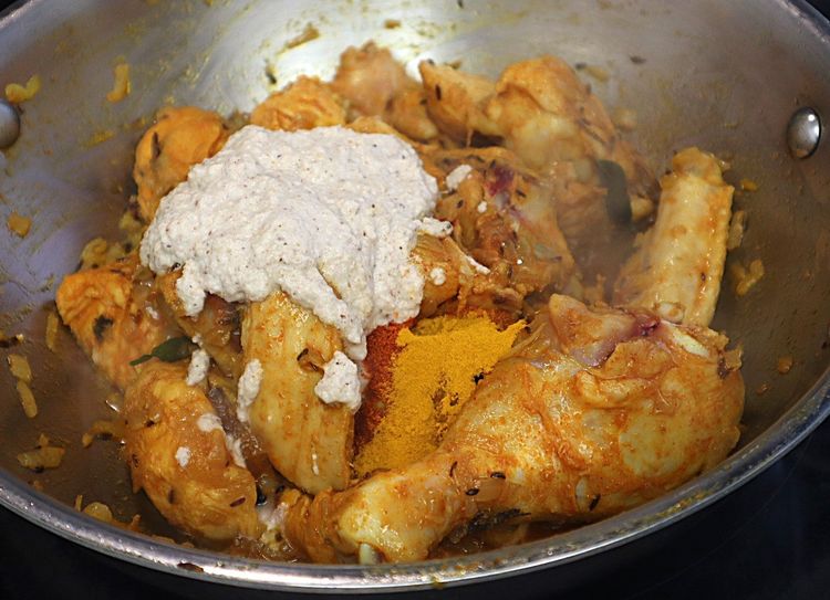 Step 1.4: Add the freshly ground masala paste, red chilli powder, and turmeric powder