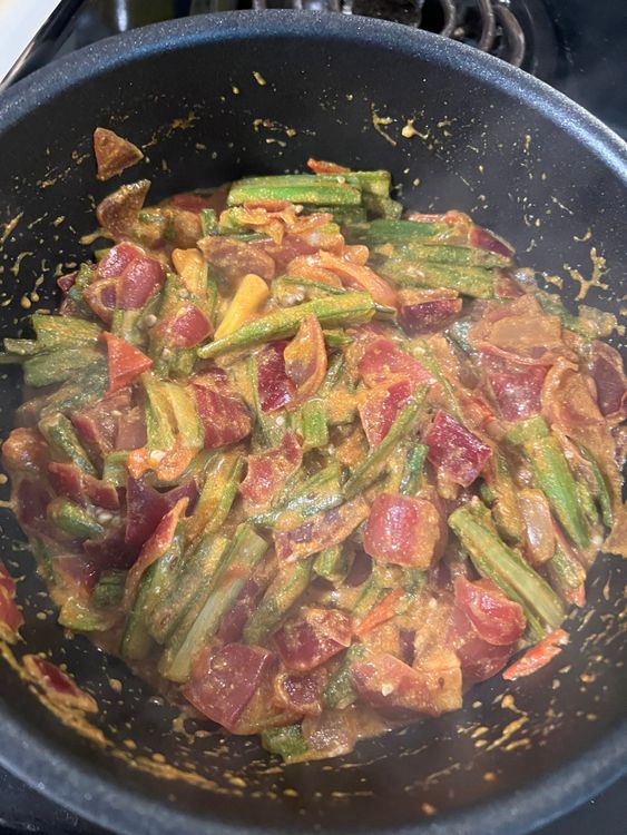 Step 1.2: Add the cooked bhindi to the mix, and stir well