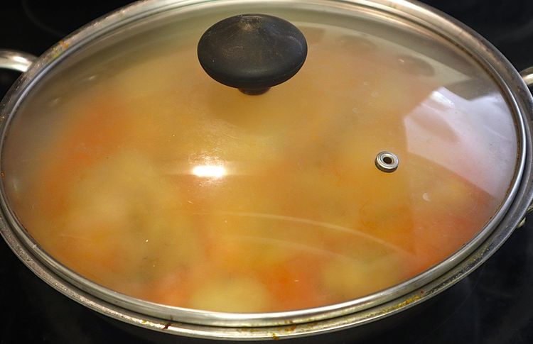 Step 1.1: Close the lid of the pan and cook over medium heat for 10 to 15 minutes with frequent stirring