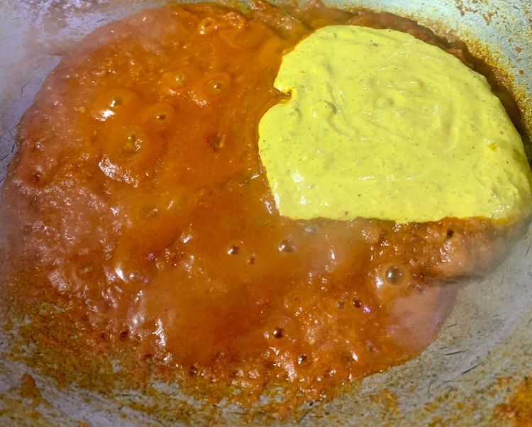 Step 3.1: Add the curd mixture and continue stirring until it is well mixed