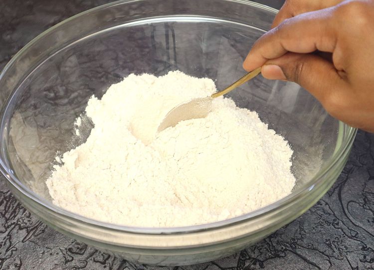 Step 1.6: In a large bowl, take wheat flour, sugar, and salt