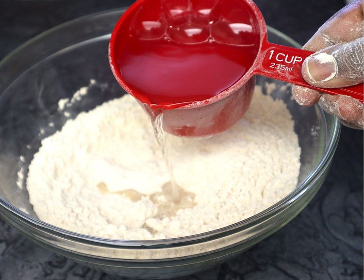Step 1.1: Add water and knead the dough