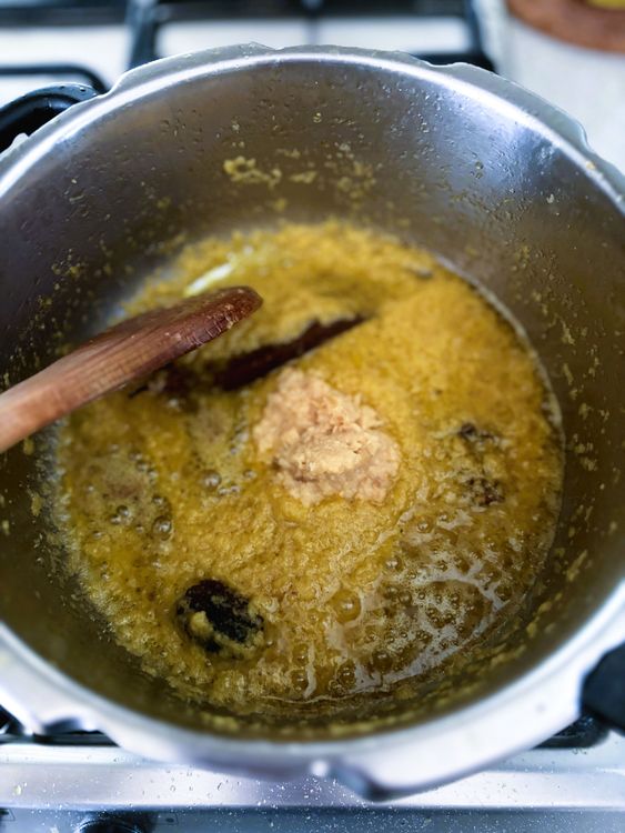 Step 2.1: Add ginger–garlic paste and cook for 1–2 minutes until the raw smell disappears