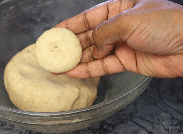 Step 1.1: Pinch a large ball-sized dough and roll to form a log