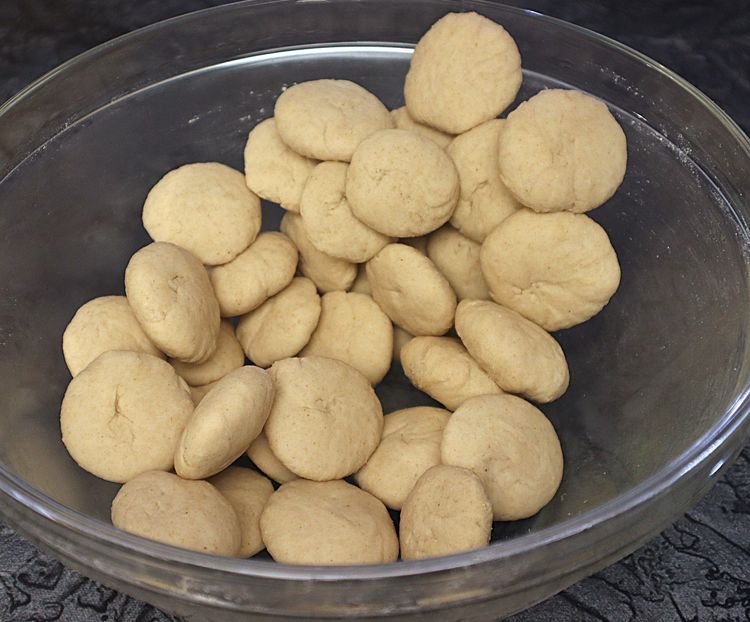 Step 1.1: Place the balls into a small bowl and add oil