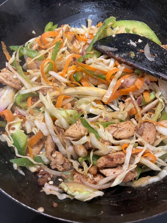 Step 4.1: Add carrots and cabbage, stir-fry for 1–2 minutes until slightly soft but still crunchy