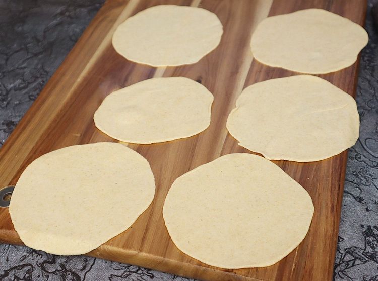 Step 1.4: Take a ball and roll using a rolling pin to a slightly thick thickness