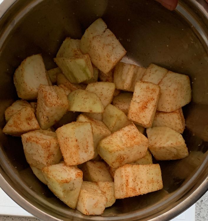 Step 1.2: Peel the eggplants and cut them into cubes