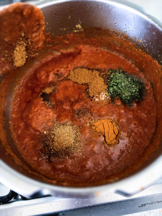 Step 2.1: Add salt, coriander powder, turmeric, channa masala, and kasuri methi