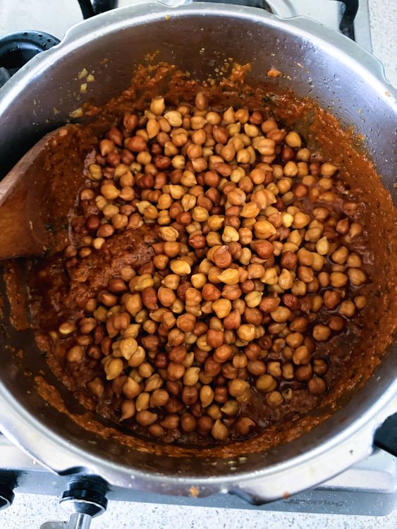 Step 3.1: Add the soaked chana and mix well with the masala