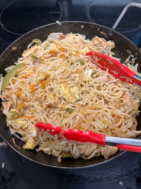 Step 6.3: Garnish with chopped spring onions and serve hot