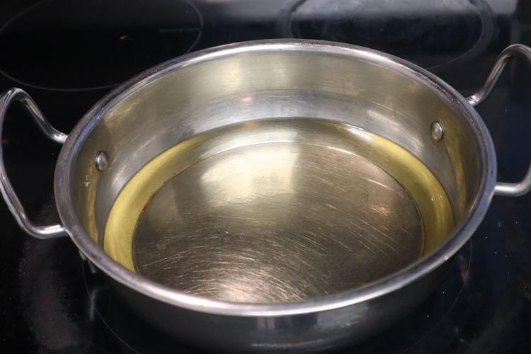 Step 1.1: Drop the rolled dough into hot oil