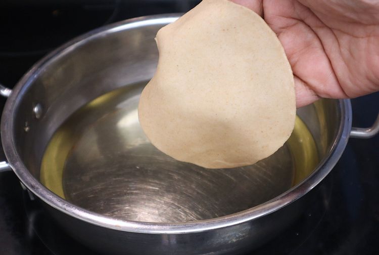 Step 1.2: Drop the rolled dough into hot oil