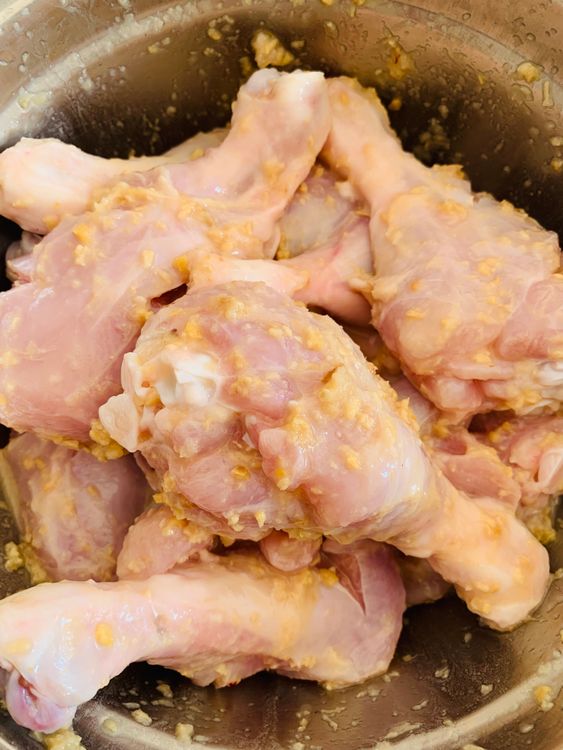 Step 1.1: Combine chicken drumsticks, ginger garlic paste, lemon juice, and salt in a bowl