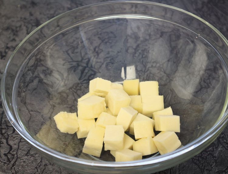Step 1.2: In a large bowl, take paneer cubes, turmeric, chilli powder, ginger garlic paste, and salt