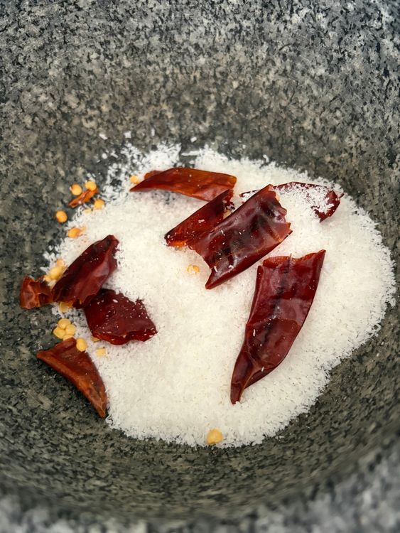 Step 2.1: Grind dry red chillies and desiccated coconut into a coarse mixture