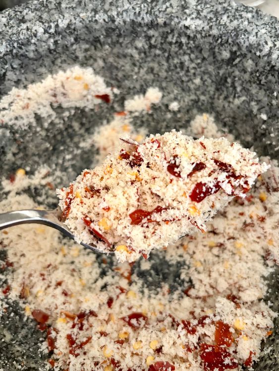 Step 2.2: Grind dry red chillies and desiccated coconut into a coarse mixture
