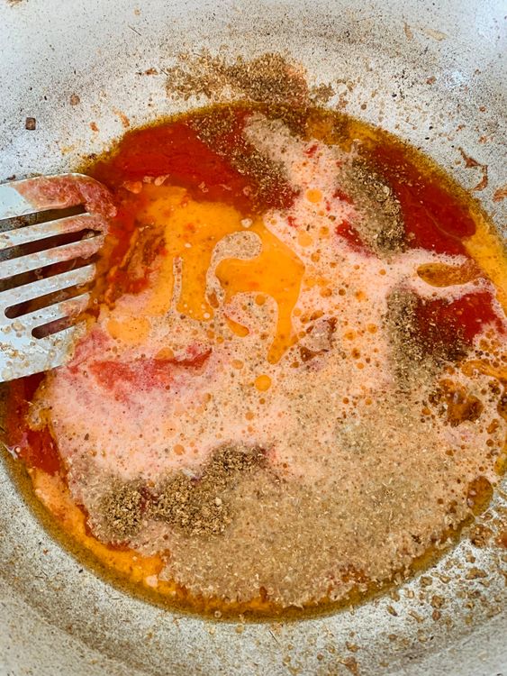 Step 3.1: Add the pureed tomatoes, red chilli powder, milk, garam masala, coriander powder, and cumin powder