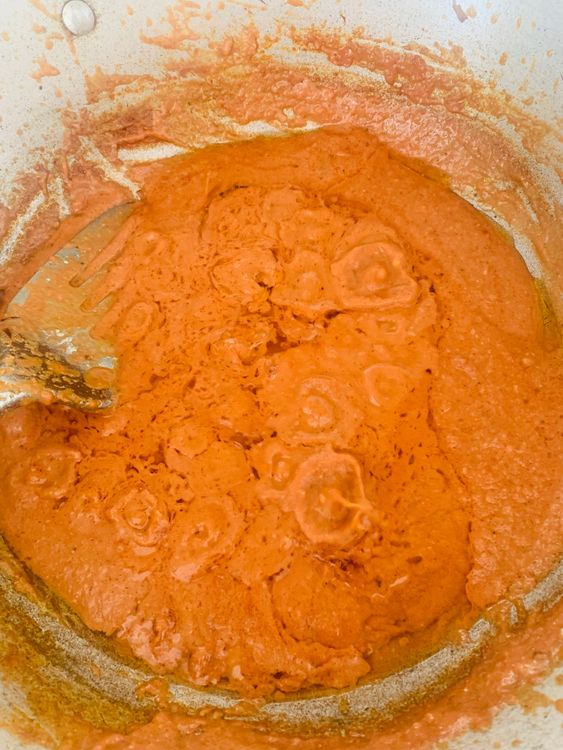 Step 3.2: Add the cream, chaat masala, and the onion-almond paste and salt to taste