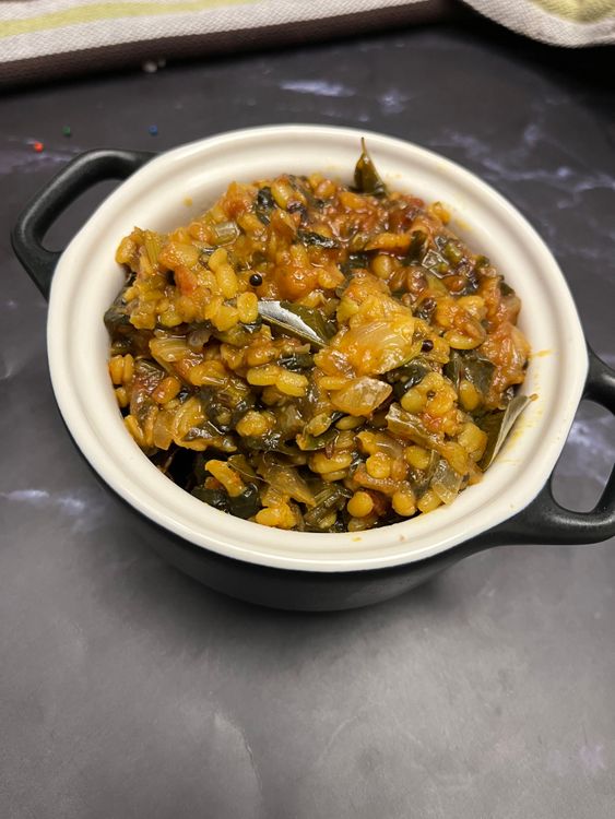 Step 6.1: Once everything is cooked well and the flavors are combined, add freshly chopped coriander leaves and give it a final stir