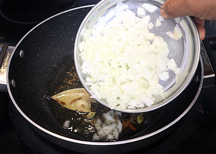 Step 2.1: Add onion and ginger garlic paste