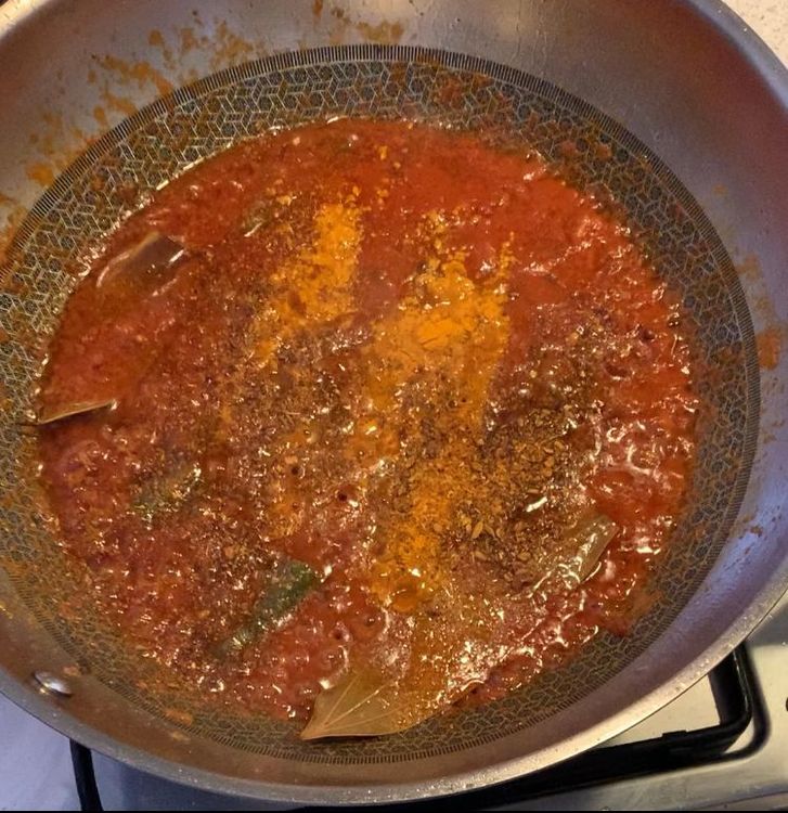 Step 1.1: Add salt, turmeric powder, achari masala powder to the wok