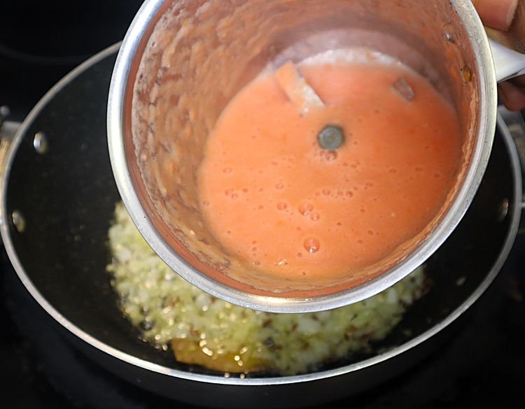Step 2.1: Add tomato puree and mix well