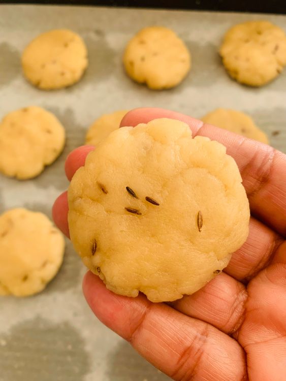 Step 1.1: Take small portions of the dough and roll them into balls about the size of a walnut