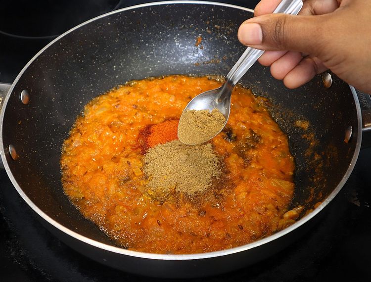 Step 2.4: * Furthermore keeping the flame on low, add ¼ tsp turmeric, 1 tsp chilli powder, 1 tsp coriander powder, ½ tsp cumin powder, ½ tsp garam masala and 1 tsp salt