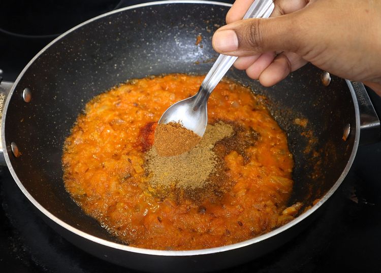 Step 2.5: * Furthermore keeping the flame on low, add ¼ tsp turmeric, 1 tsp chilli powder, 1 tsp coriander powder, ½ tsp cumin powder, ½ tsp garam masala and 1 tsp salt