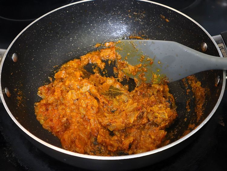 Step 2.7: * Furthermore keeping the flame on low, add ¼ tsp turmeric, 1 tsp chilli powder, 1 tsp coriander powder, ½ tsp cumin powder, ½ tsp garam masala and 1 tsp salt
