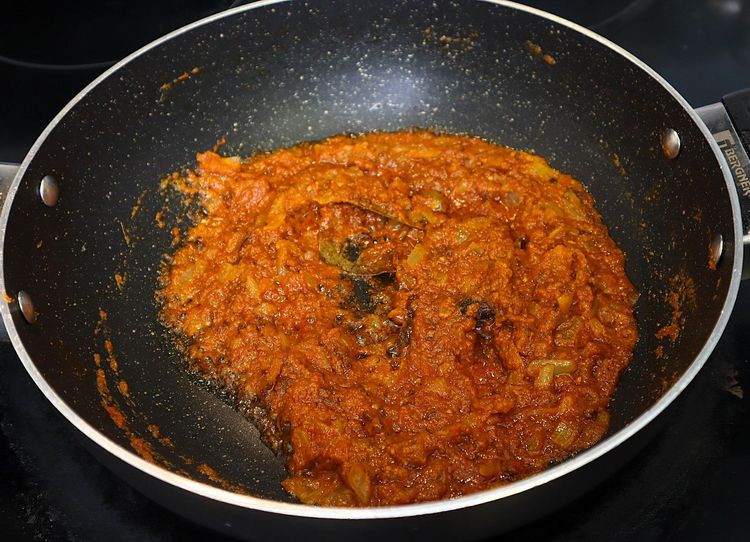 Step 2.8: * Furthermore keeping the flame on low, add ¼ tsp turmeric, 1 tsp chilli powder, 1 tsp coriander powder, ½ tsp cumin powder, ½ tsp garam masala and 1 tsp salt