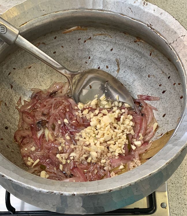 Step 1.1: Add chopped garlic and ginger