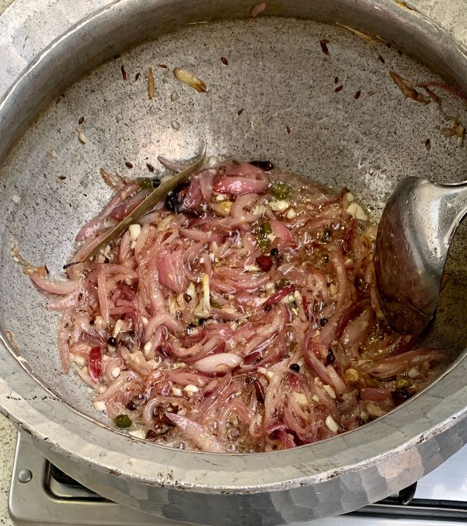 Step 1.2: Add chopped garlic and ginger