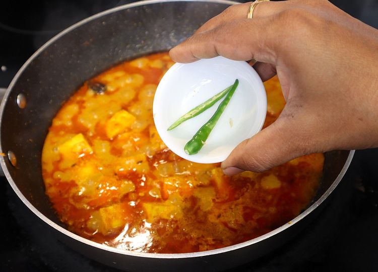 Step 2.1: Add slit Green Chilli, kasuri methi, and coriander