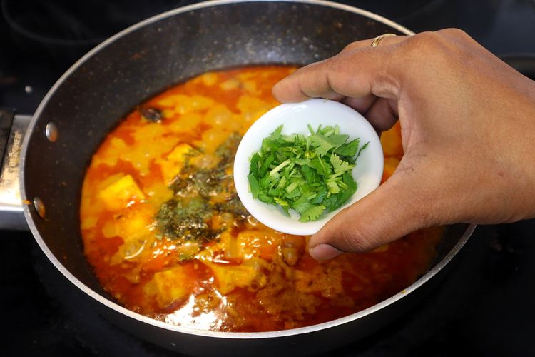 Step 2.3: Add slit Green Chilli, kasuri methi, and coriander