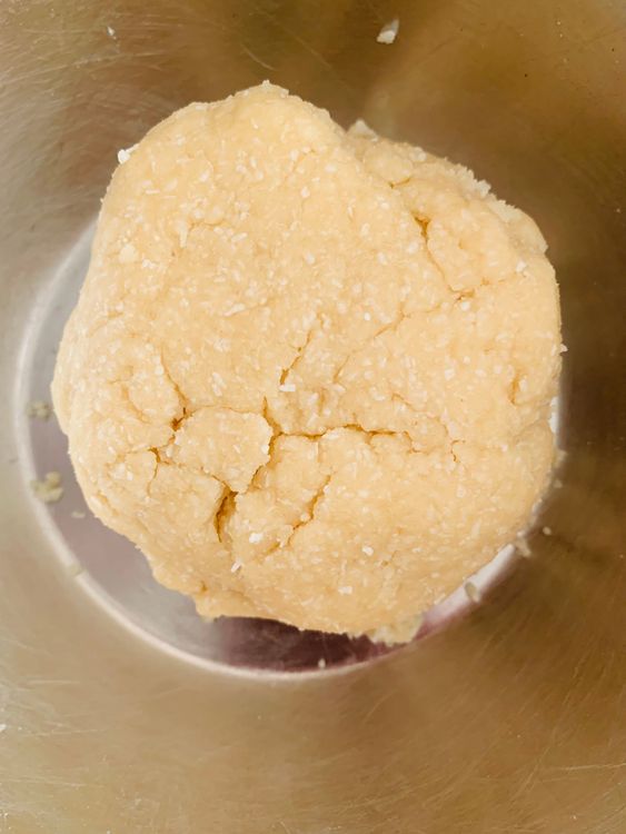 Step 1.1: Gradually add the flour mixture to the wet ingredients, mixing gently with a spatula until a soft dough forms