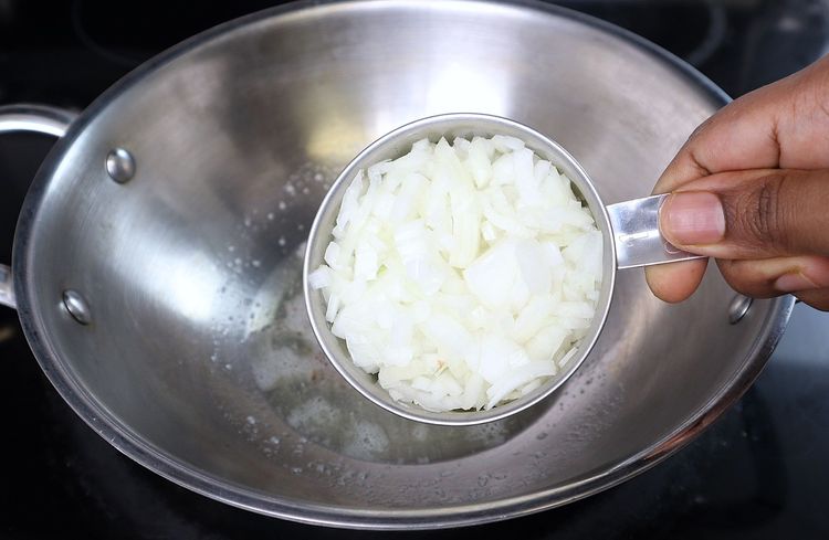 Step 3.1: Add finely chopped onions and roast until they turn light golden in color
