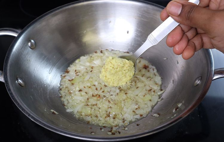 Step 3.1: Add ginger and garlic paste and sauté until the raw smell disappears