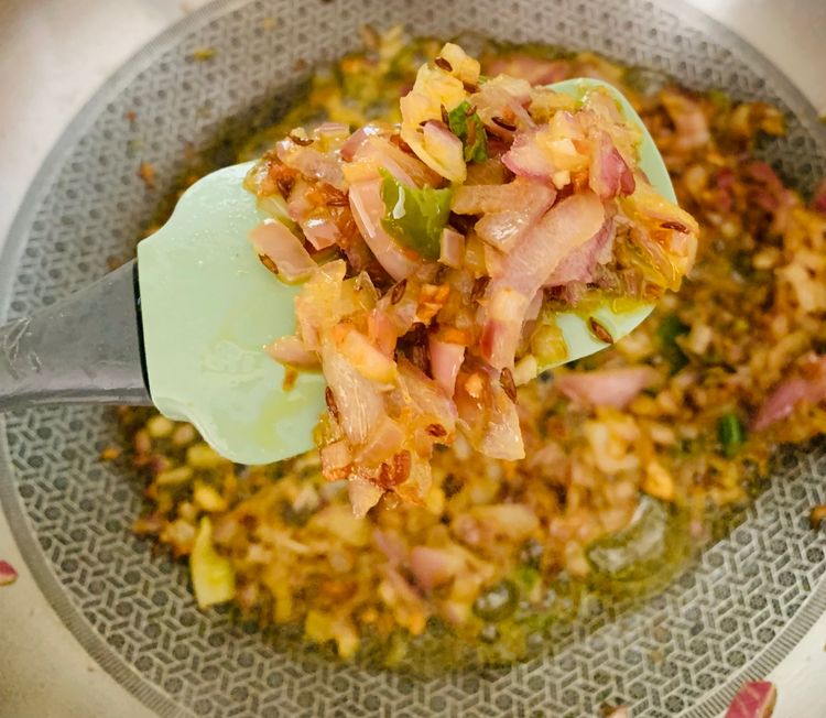 Step 1.1: Add the chopped onions and cook for 3-4 minutes until they turn pinkish and translucent