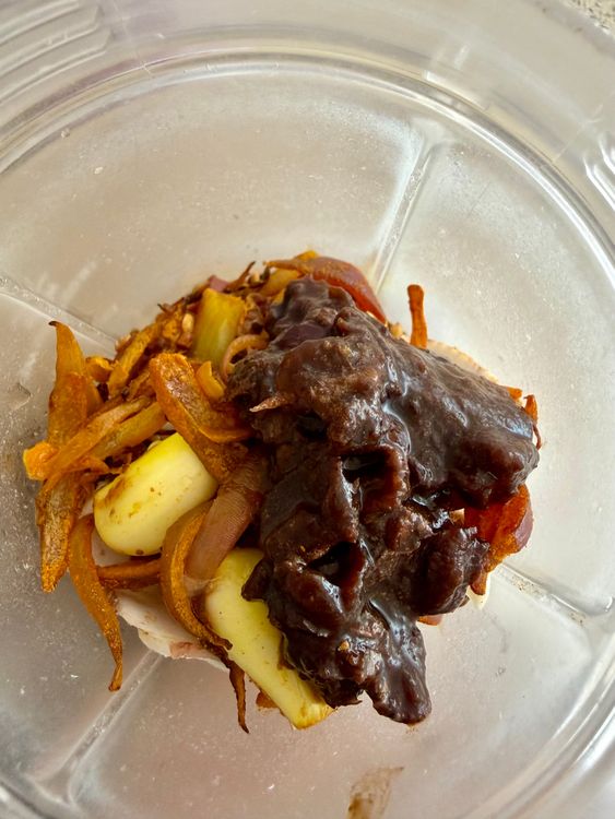 Step 1.1: Blend the roasted spices, roasted garlic-onion, coconut, and tamarind pulp into a smooth paste, adding a little water as needed