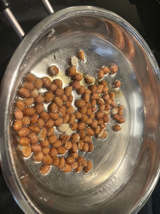 Step 4.1: Add peanuts and fry until golden