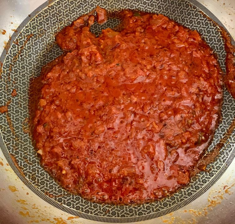 Step 1.2: Add the ground tomatoes, red chilli powder, turmeric powder, coriander powder, garam masala powder, salt, and [Chinese 5-spice powder](https://www